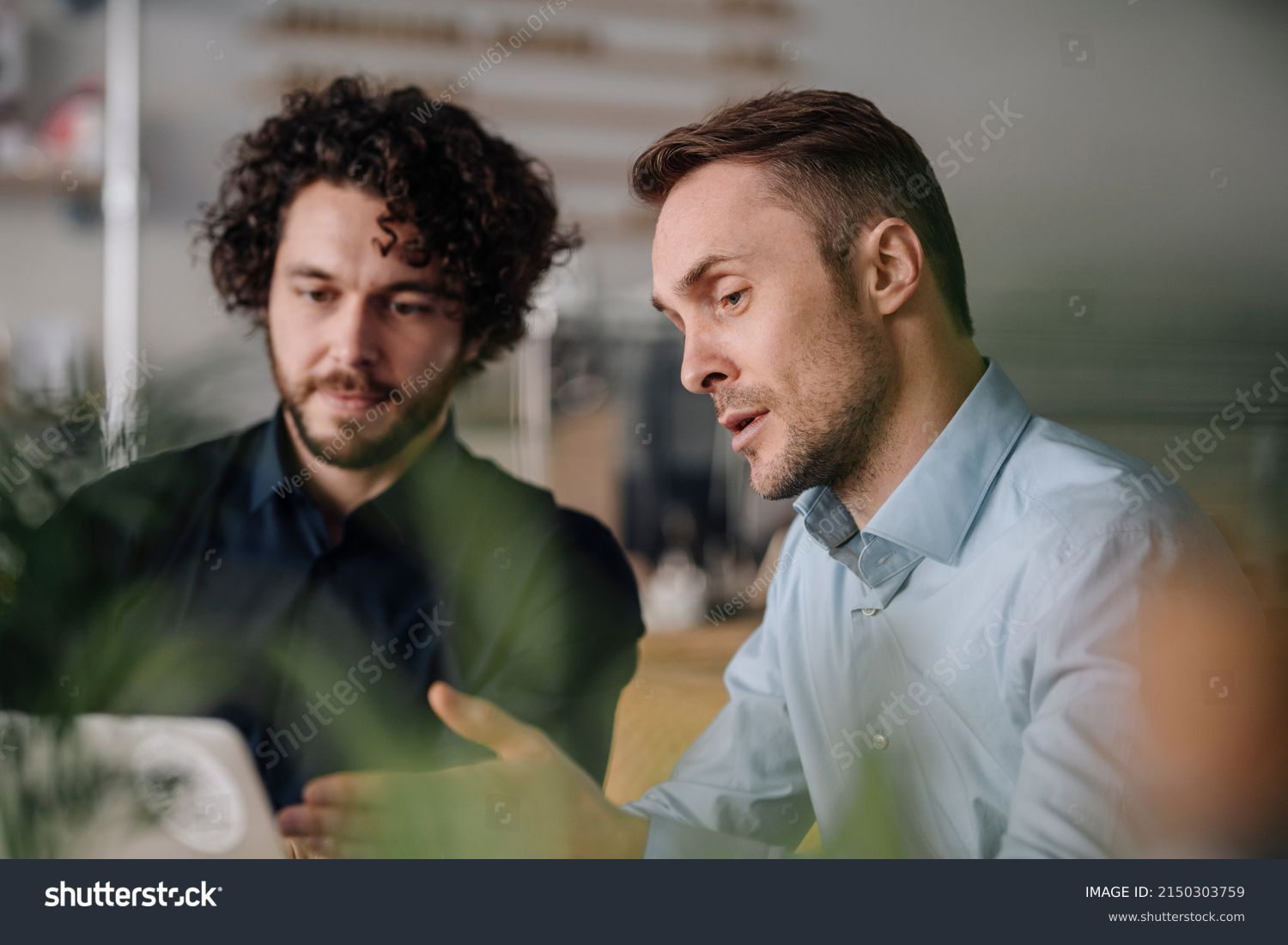 Team collaborating on AI strategy in a modern office